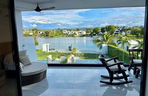 Girardot Cabaña | Lakefront villa with private Dook, Piscina & Jacuzzi