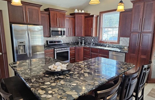 Wetmore Casa | Lakehouse near Pictured Rocks, Trails, Personal Bar, Game Room, & Hot Tub!