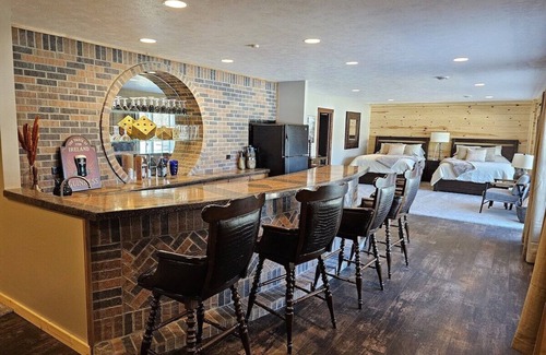 Wetmore Casa | Lakehouse near Pictured Rocks, Trails, Personal Bar, Game Room, & Hot Tub!