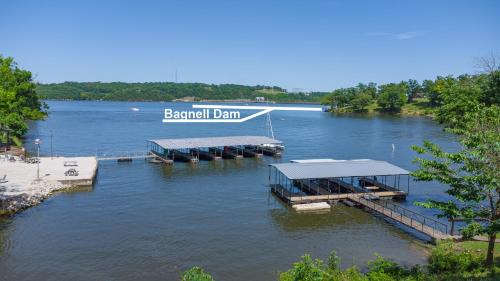 Lake Ozark Casa | Lakeshore Fishing Cabin 5, dock, boat slip and firepit area