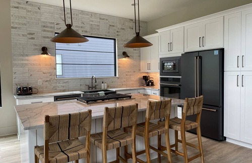 Winchester Casa | Lakeshore Modern! Lake front with platform dock and 2 kayaks, firepit and views