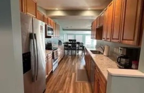 Sand Creek Casa | Lakeside Beach Getaway with A Gorgeous Kitchen & Dining Room with Room for 10.