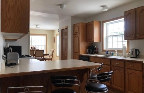 Presque Isle Casa | Lakeside Luxury, 4 bedrooms, 2 bath, sleeps 10. Outdoor Grill, Kayaks, Firepit.