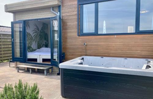 Anjum Casa | Lakeview 6 pers Holiday home Aurora with fenced garden, whirlpool and sauna