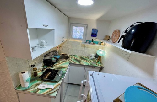 Risan Apartamento | Pequeño apartamento en Laniakea en casa compartida