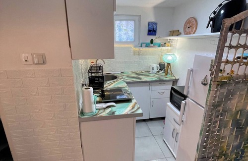 Risan Apartamento | Pequeño apartamento en Laniakea en casa compartida