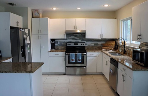 Interchange Square Casa | Large 4bd 2bth pool home with waterfall feature and private back yard!