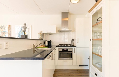 Municipality of Uitgeest Casa | Large apartment with terrace directly on the water