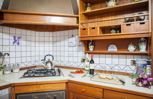 Santa Venerina Villa | Elegante villa en jardín panorámico con piscina privada.