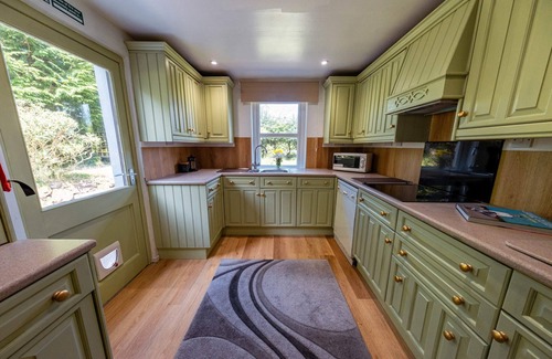 Newton Stewart Casa | Large country house with garden, outdoor spa area & games room by Get Better Get