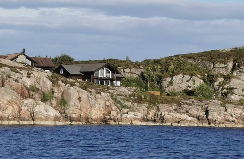 Steinsland Cabina | Gran casa familiar junto al mar. Nueva cabaña moderna con excelentes instalaciones.
