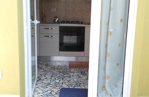 Fano Apartamento | Gran patio privado. Acuerdo de playa, alquiler de bicicletas, pizzería. Wifi gratis