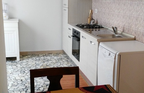 Fano Apartamento | Gran patio privado. Acuerdo de playa, alquiler de bicicletas, pizzería. Wifi gratis