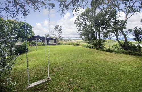 Ruakaka Casa | Large sunny home with stunning panoramic sea views of Bream Bay