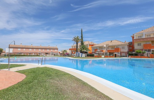 Islantilla Casa | LAS CUMBRES - Acogedor apartamento con piscina compartida