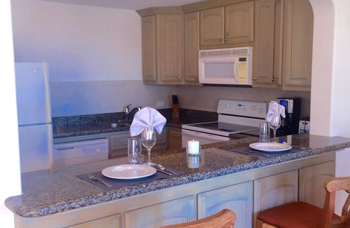 Zona Hotelera Condominio | Las Mañanitas - Frente a la playa en planta baja 1BR Condo, piscina semi-privada