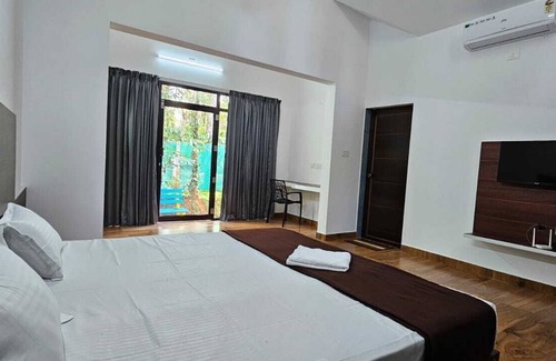 Sulthan Bathery Cama Y Desayuno | Le Vista Resort - Wayanad