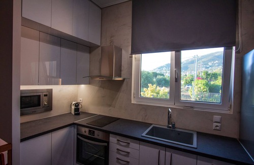 Anavyssos Villa | El Lida Garden Vila ofrece un jardín con piscina y zona de barbacoa ....
