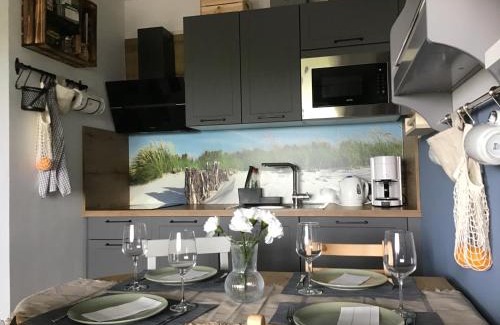 Dornum Apartamento | Liebevoll eingerichtete Ferienwohnung Lüttje Koje
