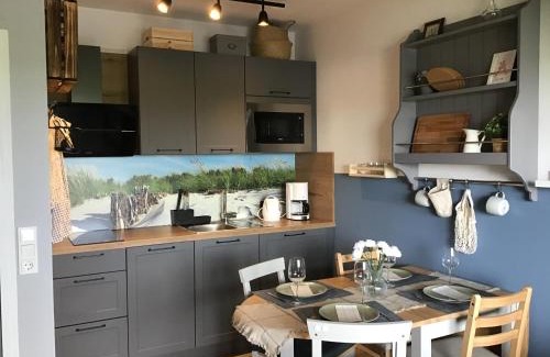 Dornum Apartamento | Liebevoll eingerichtete Ferienwohnung Lüttje Koje