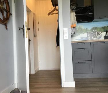 Dornum Apartamento | Liebevoll eingerichtete Ferienwohnung Lüttje Koje