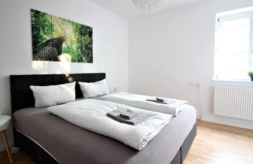 Wuerzburg Apartamento | Light-flooded city apartment with balcony and garden