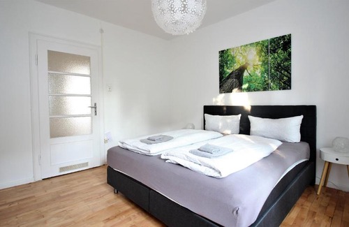 Wuerzburg Apartamento | Light-flooded city apartment with balcony and garden