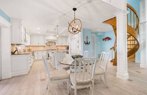 Palm City Casa | Light House Point Canal Front Pool Home with Dock and Ice Machine