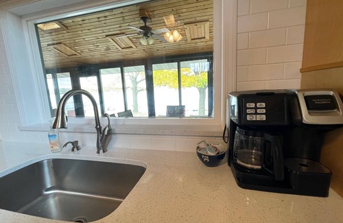Webster Casa | Limited summer dates Lakefront sandy beach, sunroom, sauna, game room, kayaks!