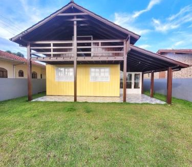 Ibiraquera Casa | LINDA CASA COM PISCINA DE FRENTE PARA A LAGOA