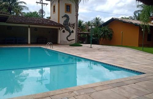 Praia da Enseada Apartamento | Linda casa em condomínio fechado