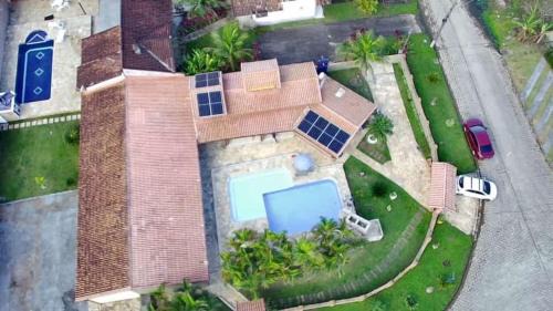 Morada da Praia Casa | Linda casa Morada da Praia com piscina privativa e muito espaço pra você e seu pet