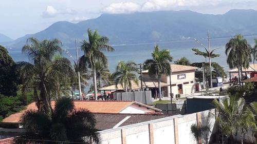 Martim de Sa Apartamento | lindo apartamento martim de sá 2 dormitórios piscina pé na areia 32 b