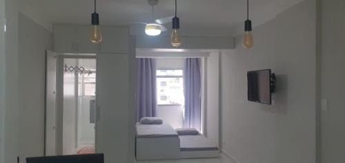 Ponta da Praia Apartamento | Lindo Studio ao lado do Aquário/Praia