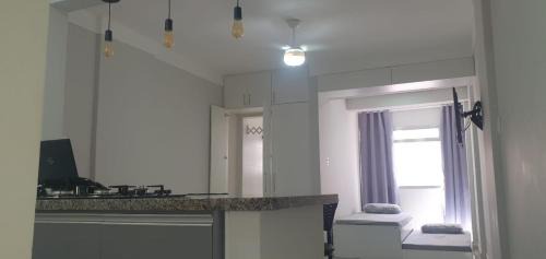 Ponta da Praia Apartamento | Lindo Studio ao lado do Aquário/Praia