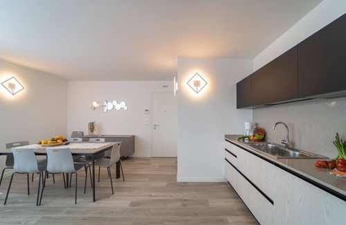 Lignano Sabbiadoro Apartamento | Viva con estilo: apartamento nuevo en una residencia de lujo