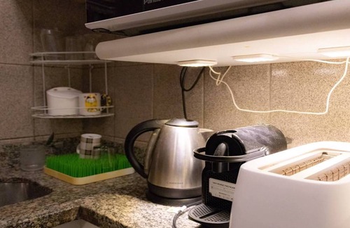 Ponta da Praia Apartamento | SALÓN MEDIA PENSIÓN ANN CANAL 6 - AIRE, WI-FI, TV POR CABLE, LAVADO Y SECADO Y GARAJE