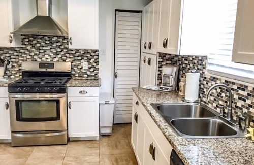 Galveston Casa | Ubicado en el corazón del distrito de almacenamiento de seda de Galveston