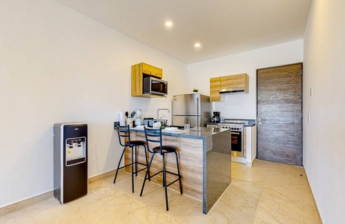 Akumal Apartamento | Lock-off apartment with balcony, rooftop pool, & kitchen - near beach