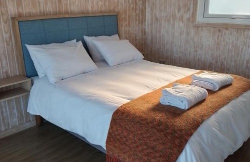Puerto Saavedra Cabina | Lodge Puerto Koupo
