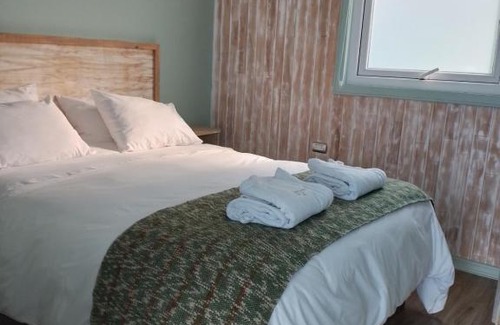 Puerto Saavedra Cabina | Lodge Puerto Koupo