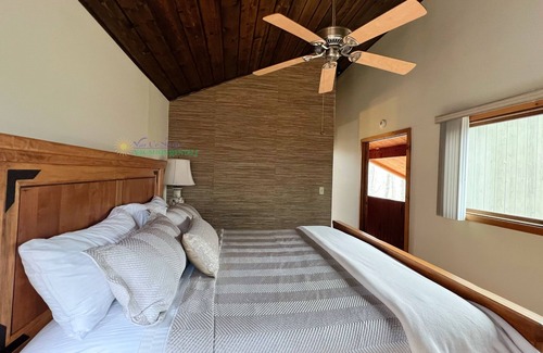 Maple City Cabina | Lodge-style multi-level home at the Homestead in Glen Arbor. Deck with grill.