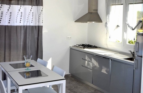 Santa-Lucia-di-Moriani Apartamento | Lodging on the beach,100 mt away,A/C, pool, restaurant,children play ground