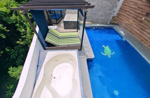 Jimenez Apartamento | Loft diseño & estilo, alberca climatizada, dos jacuzzis para tu uso personal y exclusivo, terraza y asador de carbon