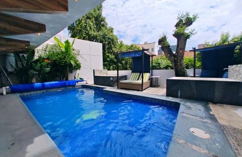 Jimenez Apartamento | Loft diseño & estilo, alberca climatizada, dos jacuzzis para tu uso personal y exclusivo, terraza y asador de carbon