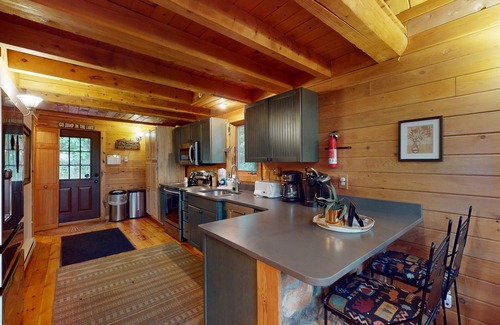 McHenry Casa | Log cabin in forested setting with private hot tub & amazing views, dog-friendly