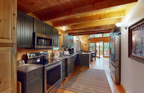 McHenry Casa | Log cabin in forested setting with private hot tub & amazing views, dog-friendly