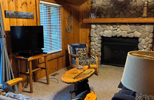 Indian River Cabina | Log Cabin on a Canal of the Indian River between Burt and Mullet Lake