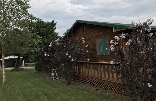 Longtown Casa | Log Cabin Wrap Around Deck with Lake View