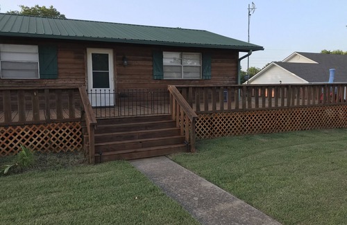 Longtown Casa | Log Cabin Wrap Around Deck with Lake View